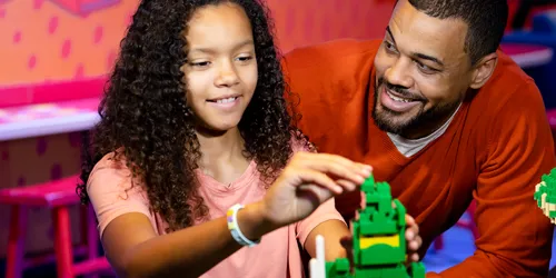 Father and daughter building at LEGOLAND Discovery Center Bay Area